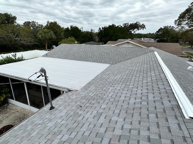 old english pewter roof and white flat roof